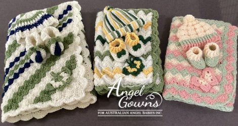 Crocheted matching blankets, beanies and booties